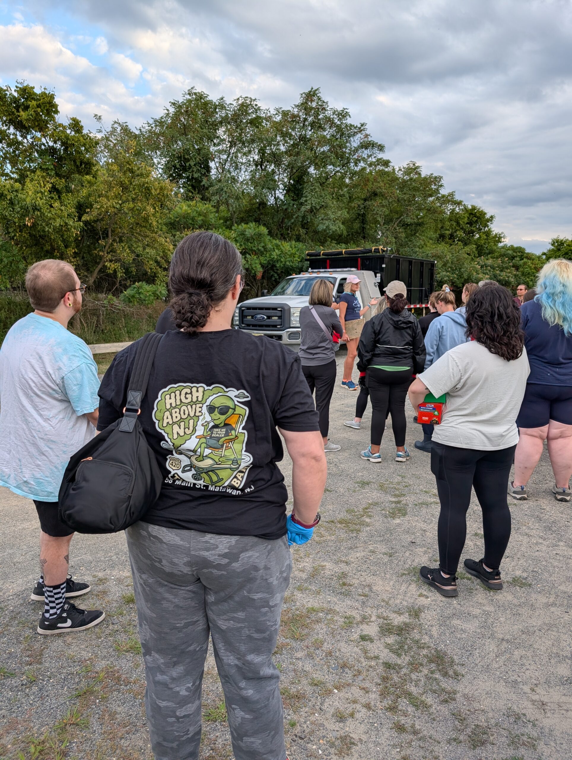 The Canna Bar team and volunteers working together during the beach cleanup